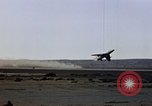 Image of crash of F-100 Supersabre jet caught in "sabre dance" California USA, 1956, second 15 stock footage video 65675045358
