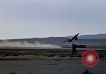 Image of crash of F-100 Supersabre jet caught in "sabre dance" California USA, 1956, second 17 stock footage video 65675045358