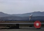 Image of crash of F-100 Supersabre jet caught in "sabre dance" California USA, 1956, second 22 stock footage video 65675045358