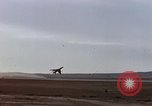 Image of crash of F-100 Super Sabre caught in "Sabre Dance" California USA, 1956, second 3 stock footage video 65675045359