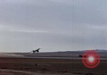 Image of crash of F-100 Super Sabre caught in "Sabre Dance" California USA, 1956, second 4 stock footage video 65675045359