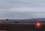 Image of crash of F-100 Super Sabre caught in "Sabre Dance" California USA, 1956, second 6 stock footage video 65675045359