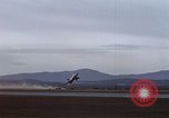 Image of crash of F-100 Super Sabre caught in "Sabre Dance" California USA, 1956, second 8 stock footage video 65675045359
