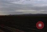 Image of crash of USAF F-100 Supersabre  California USA, 1956, second 23 stock footage video 65675045360