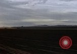 Image of crash of USAF F-100 Supersabre  California USA, 1956, second 24 stock footage video 65675045360