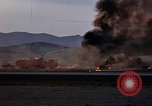 Image of crash of USAF F-100 Supersabre  California USA, 1956, second 49 stock footage video 65675045360