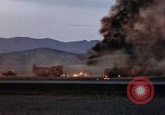 Image of crash of USAF F-100 Supersabre  California USA, 1956, second 52 stock footage video 65675045360