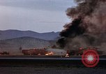 Image of crash of USAF F-100 Supersabre  California USA, 1956, second 54 stock footage video 65675045360
