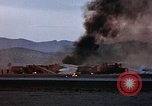 Image of crash of USAF F-100 Supersabre  California USA, 1956, second 62 stock footage video 65675045360
