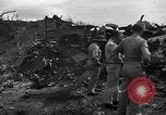 Standbild B-29 Crash Insel Tinian Marianen, 1945, aus Sekunde 15 historischem Filmmaterial Videoclip 65675045366