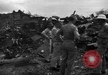 Standbild B-29 Crash Insel Tinian Marianen, 1945, aus Sekunde 16 historischem Filmmaterial Videoclip 65675045366
