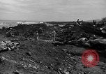 Standbild B-29 Crash Insel Tinian Marianen, 1945, aus Sekunde 58 historischem Filmmaterial Videoclip 65675045366