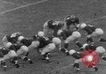 Image of football match Connecticut USA, 1952, second 11 stock footage video 65675045410