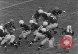 Image of football match Connecticut USA, 1952, second 12 stock footage video 65675045410