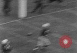 Image of football match Connecticut USA, 1952, second 15 stock footage video 65675045410