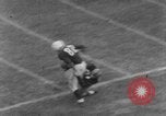 Image of football match Connecticut USA, 1952, second 16 stock footage video 65675045410