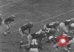 Image of football match Connecticut USA, 1952, second 28 stock footage video 65675045410