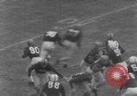 Image of football match Connecticut USA, 1952, second 29 stock footage video 65675045410