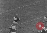 Image of football match Connecticut USA, 1952, second 30 stock footage video 65675045410