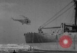 Image of The SS Yorkmar aground on beach Grays Harbor Washington USA, 1952, second 16 stock footage video 65675045422