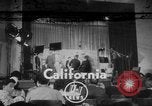 Image of Christmas greeting recorded for American soldiers overseas California United States USA, 1952, second 1 stock footage video 65675045424