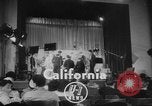 Image of Christmas greeting recorded for American soldiers overseas California United States USA, 1952, second 3 stock footage video 65675045424