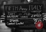 Image of propaganda leaflet bundles World War 2 Italy, 1945, second 1 stock footage video 65675045532