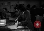 Image of propaganda leaflet bundles World War 2 Italy, 1945, second 40 stock footage video 65675045532
