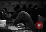 Image of propaganda leaflet bundles World War 2 Italy, 1945, second 45 stock footage video 65675045532