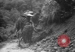 Immagine di Indigeni birmani La Birmania, 1944, secondo 54 filmato di repertorio 65675045604