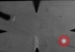 Image of P-47 of U.S. 404th squadron strafing European Theater, 1945, second 7 stock footage video 65675045658