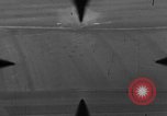 Image of P-47 of U.S. 404th squadron strafing European Theater, 1945, second 15 stock footage video 65675045658
