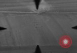 Image of P-47 of U.S. 404th squadron strafing European Theater, 1945, second 16 stock footage video 65675045658