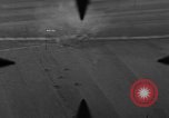 Image of P-47 of U.S. 404th squadron strafing European Theater, 1945, second 18 stock footage video 65675045658