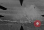 Image of P-47 of U.S. 404th squadron strafing European Theater, 1945, second 20 stock footage video 65675045658
