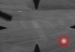 Image of P-47 of U.S. 404th squadron strafing European Theater, 1945, second 27 stock footage video 65675045658