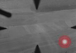Image of P-47 of U.S. 404th squadron strafing European Theater, 1945, second 28 stock footage video 65675045658