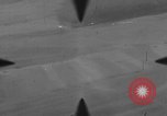 Image of P-47 of U.S. 404th squadron strafing European Theater, 1945, second 30 stock footage video 65675045658