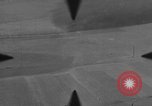 Image of P-47 of U.S. 404th squadron strafing European Theater, 1945, second 33 stock footage video 65675045658