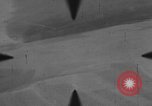 Image of P-47 of U.S. 404th squadron strafing European Theater, 1945, second 34 stock footage video 65675045658