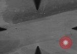Image of P-47 of U.S. 404th squadron strafing European Theater, 1945, second 35 stock footage video 65675045658