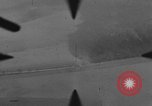 Image of P-47 of U.S. 404th squadron strafing European Theater, 1945, second 36 stock footage video 65675045658
