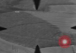 Image of P-47 of U.S. 404th squadron strafing European Theater, 1945, second 39 stock footage video 65675045658