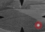 Image of P-47 of U.S. 404th squadron strafing European Theater, 1945, second 40 stock footage video 65675045658