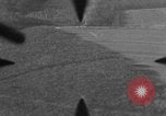 Image of P-47 of U.S. 404th squadron strafing European Theater, 1945, second 42 stock footage video 65675045658