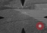 Image of P-47 of U.S. 404th squadron strafing European Theater, 1945, second 43 stock footage video 65675045658