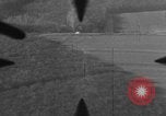 Image of P-47 of U.S. 404th squadron strafing European Theater, 1945, second 44 stock footage video 65675045658