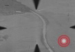 Image of P-47 of U.S. 404th squadron strafing European Theater, 1945, second 49 stock footage video 65675045658