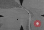 Image of P-47 of U.S. 404th squadron strafing European Theater, 1945, second 51 stock footage video 65675045658