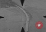 Image of P-47 of U.S. 404th squadron strafing European Theater, 1945, second 53 stock footage video 65675045658